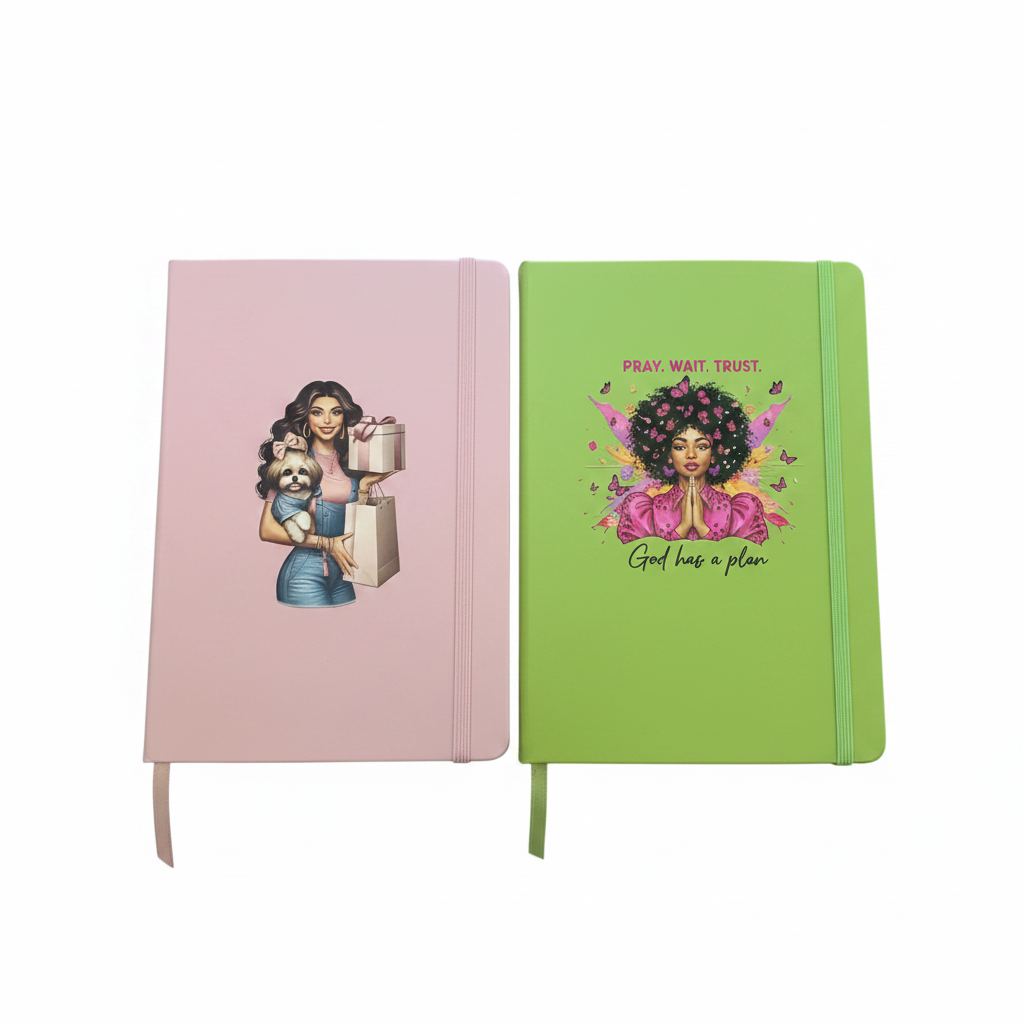 Pink journal with woman and dog, green Pray Wait Trust journal on white background